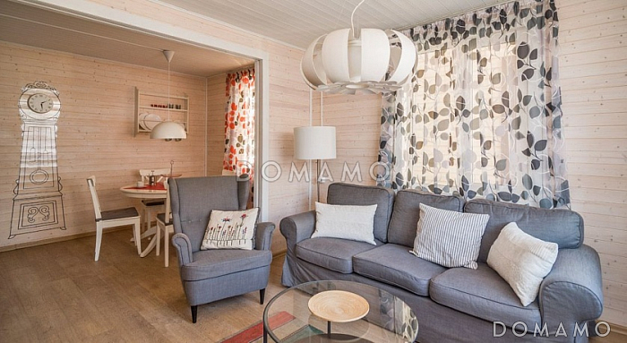 Проект дома из клееного бруса с облицовкой деревянной вагонкой