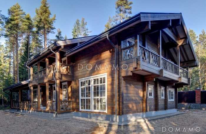 Проект дома из клееного бруса с мансардным этажом, огромной террасой и кабинетом на первом этаже