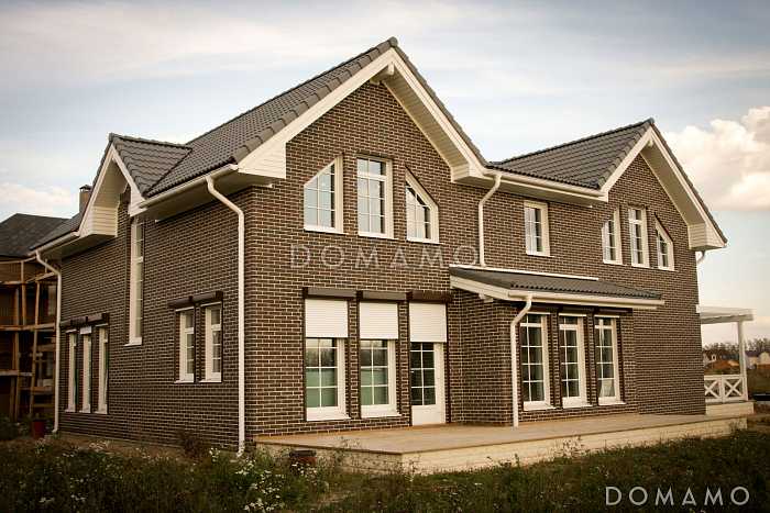 Проект кирпичного дома с открытой террасой