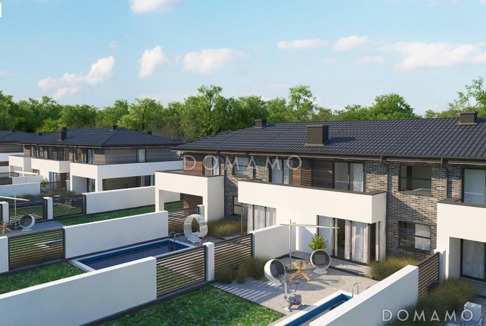 Проект современного комфортного двухэтажного дома из газобетона для двух семей