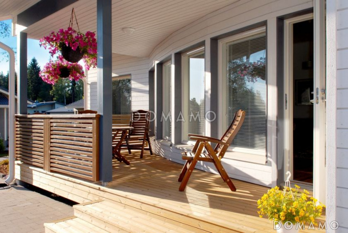 Проект каркасного дома с гостиной нестандартной формы