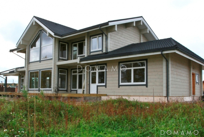 Проект большого деревянного дома из клееного бруса с бильярдной