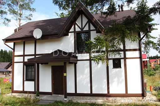 Проект дома из пеноблоков в стиле фахверк с сауной на мансардном этаже