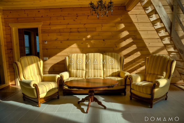 Проект двухэтажного дома из клееного бруса с шестью спальнями и гостиной на втором этаже