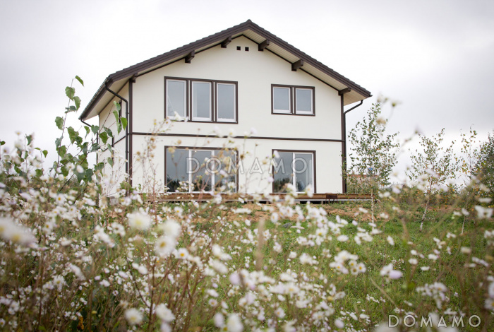 Проект каркасного дома 10х10 с мансардой