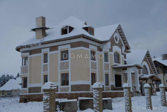 Проект солидного коттеджа с гаражом, сауной и тренажёрным залом