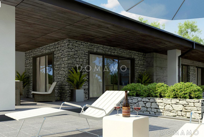 Проект одноэтажного дома из кирпича с просторной гостиной, тремя спальнями и гаражом