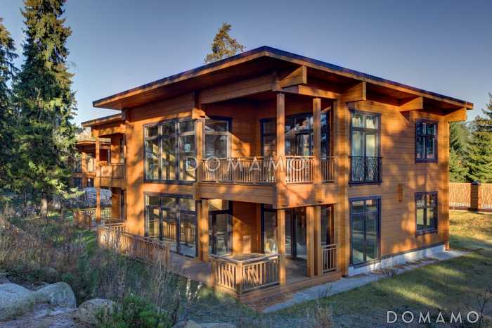 Проект двухэтажного дома из клееного бруса с кабинетом на первом этаже