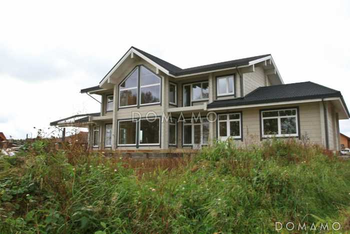 Проект большого деревянного дома из клееного бруса с бильярдной