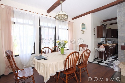 Проект дома из кирпича с отделкой фасадов в стиле фахверк, сауной на мансардном этаже