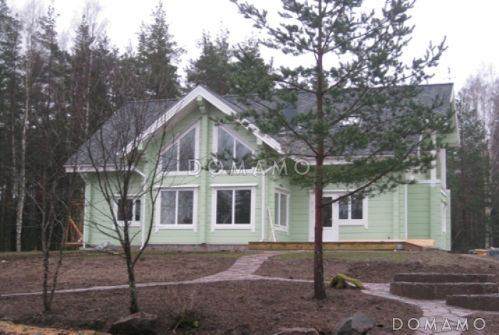 Проект деревянного дома из клееного бруса с большим эркером который является архитектурным украшением всего дома