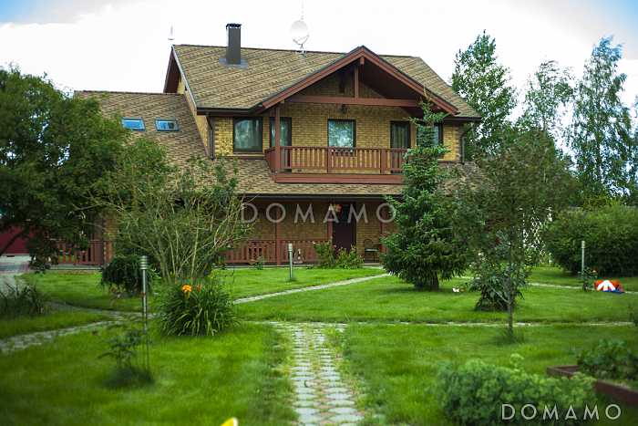 Проект комфортабельного каркасного дома с просторной кухней и вторым светом