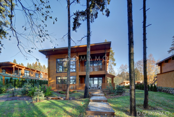 Проект двухэтажного дома из клееного бруса с сауной и гостевой комнатой на первом этаже