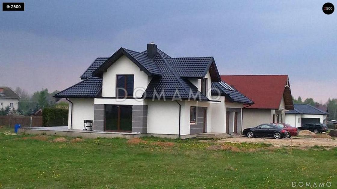 Проект классического одноэтажного мансардного дома из кирпича с дополнительной спальней на первом этаже, с тремя балконами и гаражом на два автомобиля / 30
