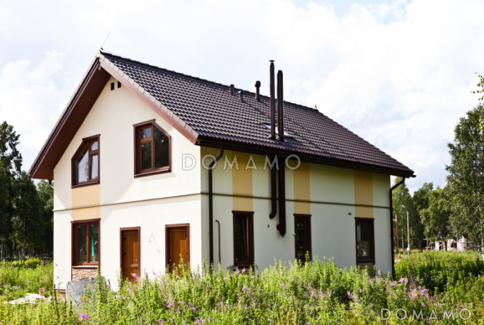 Проект кирпичного дома 9 на 10 с четырьмя спальнями