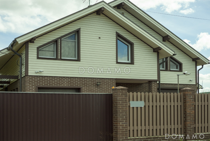 Проект каркасного дома с отделкой из двух материалов