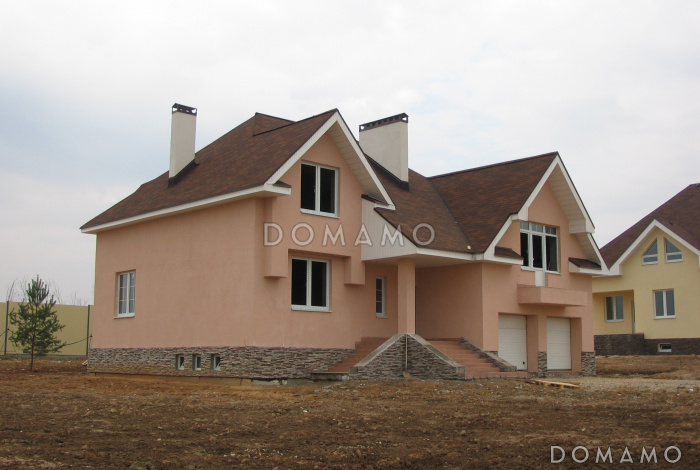 Проект дома из кирпича с облицовкой стен в стиле фахверк