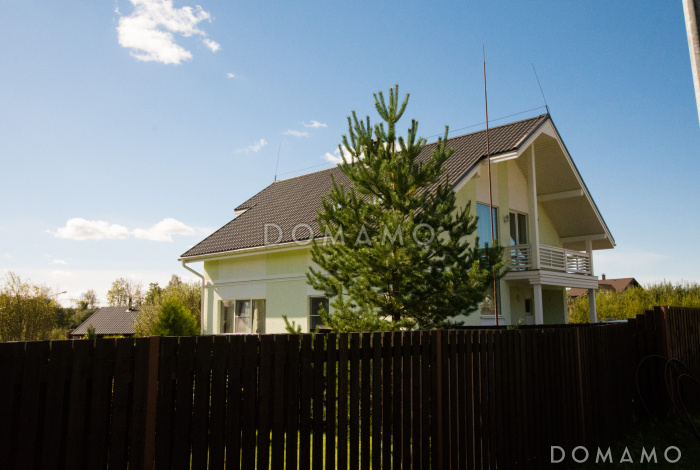 Проект дома из газобетона с угловой террасой