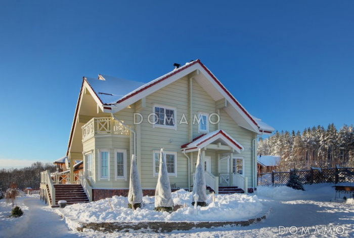 Проект дома из клееного бруса с гостиной, совмещенной с кухней-столовой