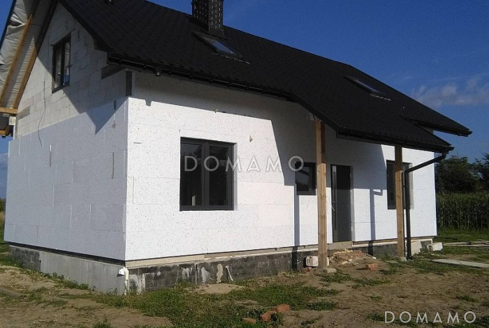 Проект компактного одноэтажного дома из газобетона с двумя спальнями, с возможностью обустроить мансарду