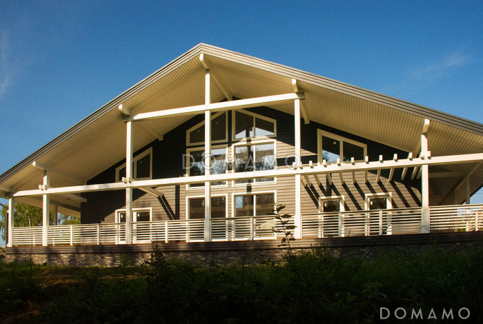 Проект дома из пеноблоков в стиле шале с сауной