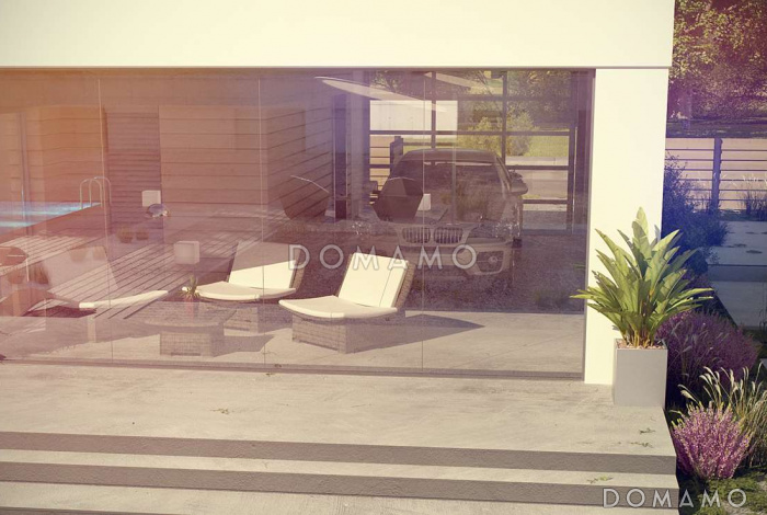 Проект современного одноэтажного дома из кирпича с тремя спальнями и оригинальным навесом для автомобиля совмещённым с террасой