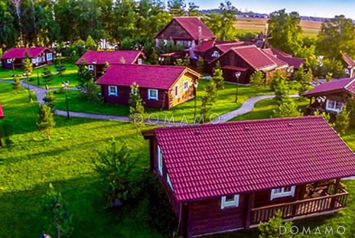 Проект небольшого одноэтажного деревянного дома из клееного бруса с двумя спальнями